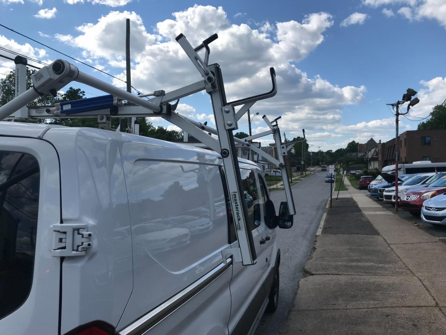 2018 White /Gray Ford Transit 150 Low Roof (1FTYE1YM7JK) with an 3.7 V6 engine, Automatic transmission, located at 577 Chester Pike, Prospect Park, PA, 19076, (610) 237-1015, 39.886154, -75.302338 - Photo#8